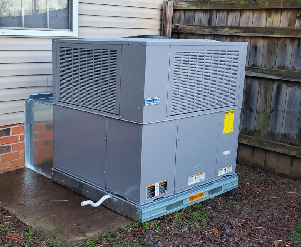 A newly installed or well-maintained HVAC package unit outside a home by Parker's Heating & Cooling in Murfreesboro, TN