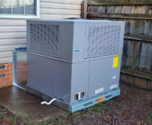 A newly installed or well-maintained HVAC package unit outside a home by Parker's Heating & Cooling in Murfreesboro, TN