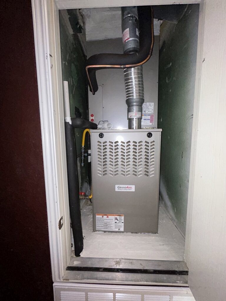 A new indoor furnace unit installed in a utility closet by South Texas Climate Control in San Antonio, TX