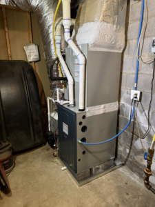 A new indoor HVAC furnace and air handler unit installation with ductwork by On-Target Heating & Air LLC in Rock Hill, SC.