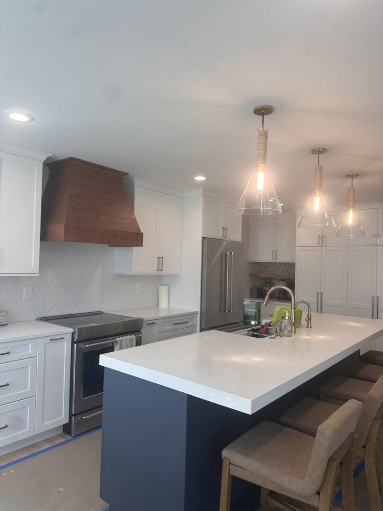 Newly installed kitchen electrical work including lighting and appliance hookups by All Electric llc in Denver, CO