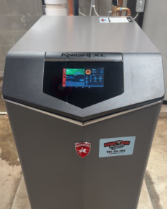 A new Knight XL boiler unit installed by Home Run Mechanical, providing efficient heating in Ann Arbor, MI.