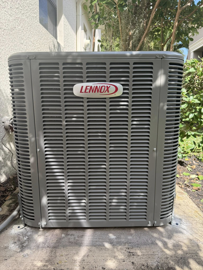 A newly installed Lennox outdoor AC unit by NextGen Aire of Southwest Florida in Punta Gorda, FL.