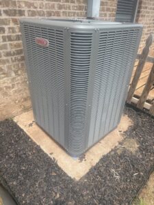 A newly installed Lennox outdoor AC unit by Wolfe Heat & Air, providing cooling services in Plano, TX
