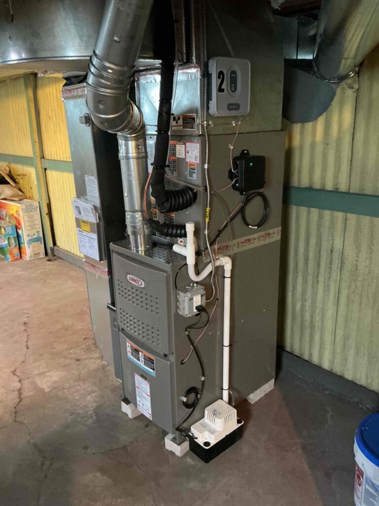 A newly installed Lennox furnace and air handler system by FLAME Heating, Cooling, Plumbing & Electrical in Warren, MI.