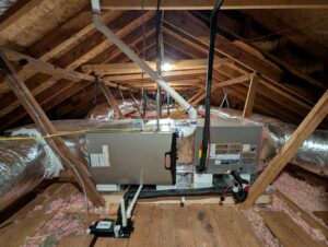 New Lennox HVAC furnace and air handler unit with ductwork installed in an attic by Stoudenmire Heating & Air Conditioning, Columbia, SC.