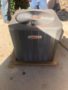 A new Lennox HVAC outdoor unit ready for installation by L.N.P Heating & Cooling in Columbus, OH