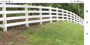 A newly installed natural wood privacy fence, showcasing quality craftsmanship by McDaniels Fencing in Huntington, WV.
