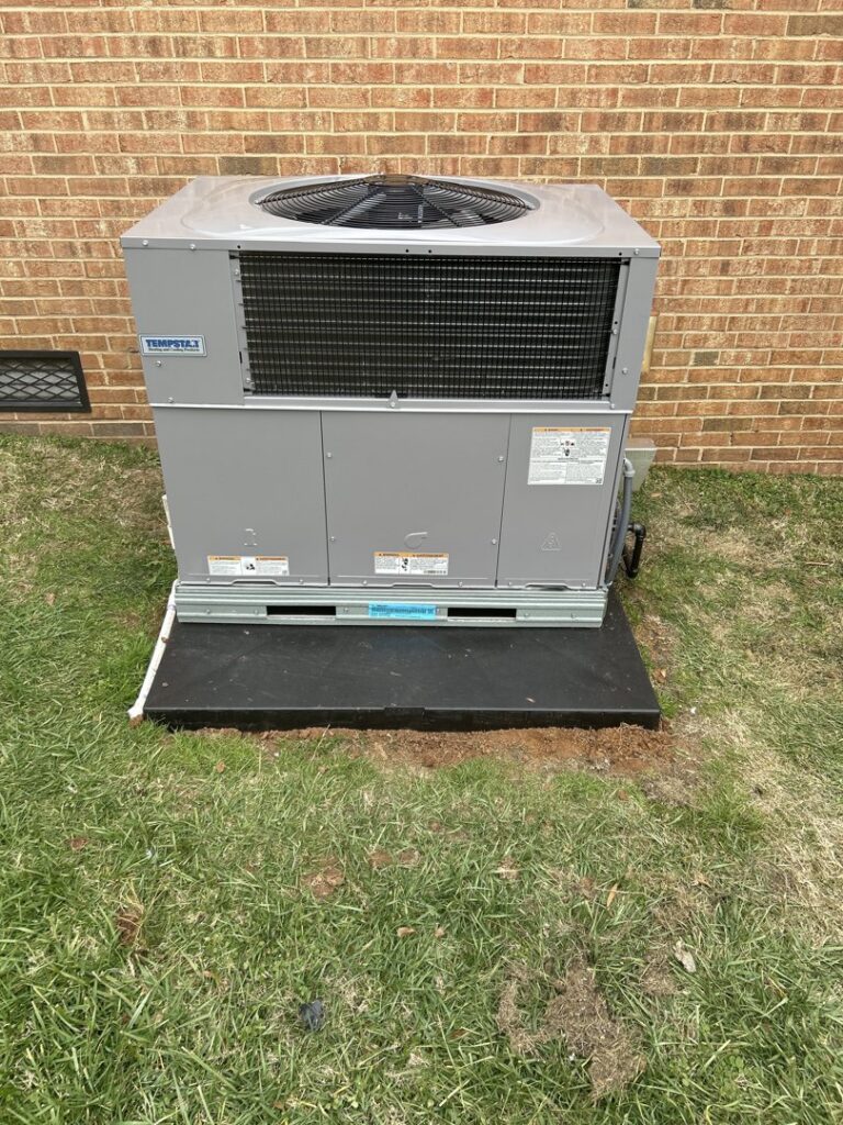 A newly installed outdoor air conditioning unit by Honesty Services in Rock Hill, SC.