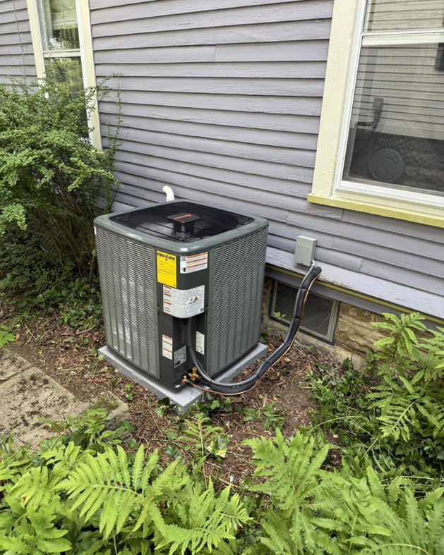 A new outdoor AC unit installation by Progressive Heating and Cooling WNY in Buffalo, NY.