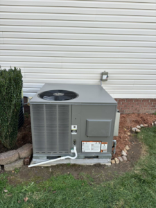 A newly installed outdoor air conditioning unit by EndorFin Service's Inc. Heating & Air Conditioning in Gloucester, VA.