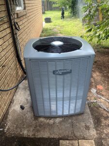 A new Armstrong Air outdoor AC condenser unit installed by Andy's Plumbing & Heat/ac for cooling in Chattanooga, TN.