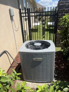 A newly installed Armstrong Air outdoor AC unit by Comfort Zone AC and Heating Services LLC in Sunrise Beach, MO