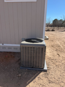 A newly installed outdoor AC unit by Legacy Mechanical LLC in Sunland Park, NM.