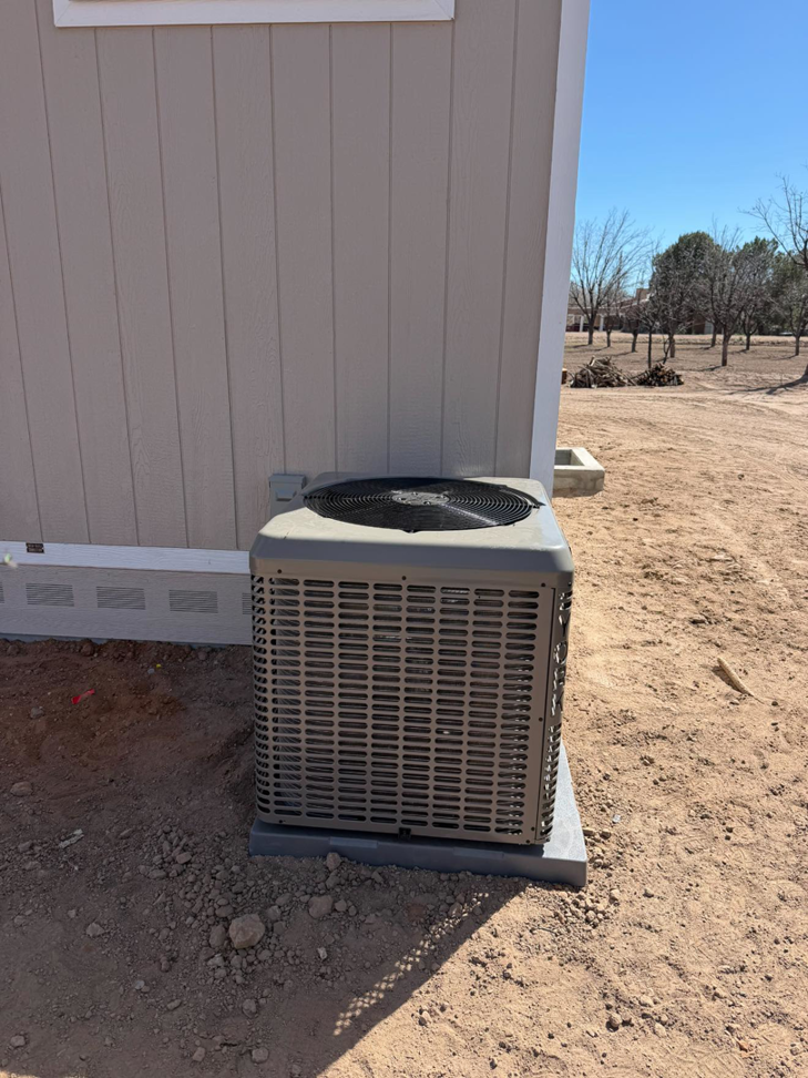 A newly installed outdoor AC unit by Legacy Mechanical LLC in Sunland Park, NM.