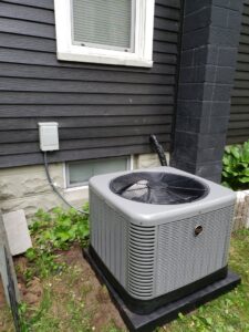 A newly installed outdoor air conditioning unit by Supertech Home Services, ensuring efficient cooling for a home in Warren, MI.