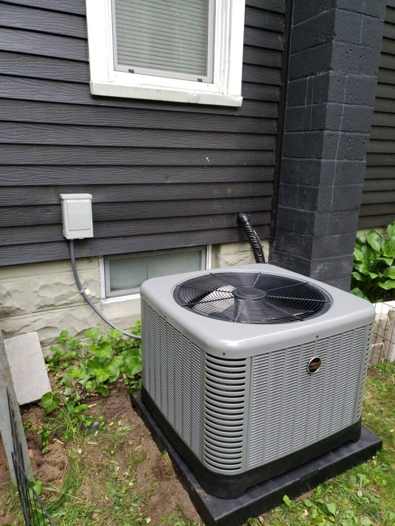 A newly installed outdoor air conditioning unit by Supertech Home Services, ensuring efficient cooling for a home in Warren, MI.