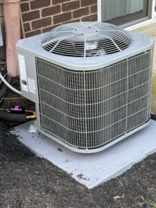 A newly installed outdoor air conditioner unit by Strine's Heating & A/C in York, PA.