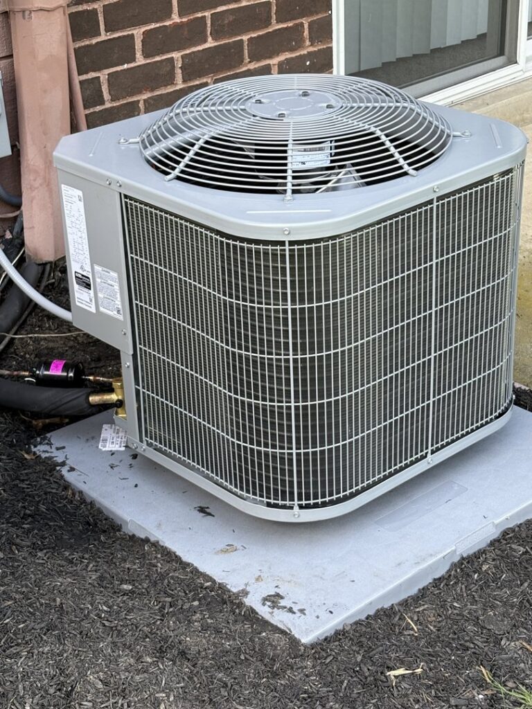 A newly installed outdoor air conditioner unit by Strine's Heating & A/C in York, PA.