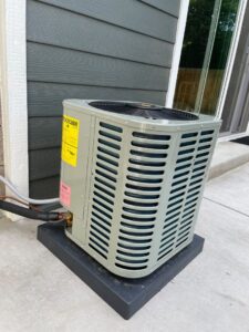 A newly installed outdoor air conditioner unit by Comfy Cave Heating and Air Conditioning in Arvada, CO.