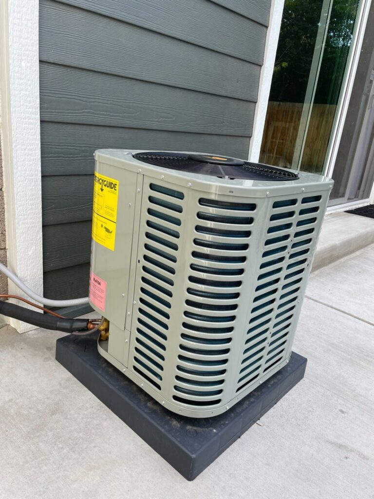 A newly installed outdoor air conditioner unit by Comfy Cave Heating and Air Conditioning in Arvada, CO.