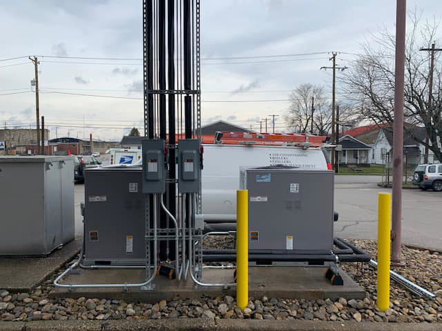 Two newly installed outdoor commercial HVAC units by Allstate Heating & Cooling in Lexington, KY.