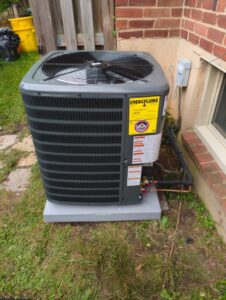 A newly installed outdoor HVAC condenser unit by ECA DuctWorks, ready for operation in Reston, VA