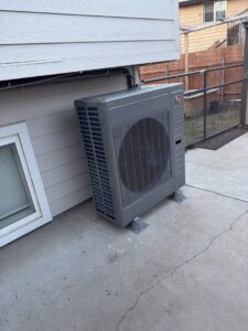 A newly installed outdoor HVAC unit by Access Heating & Air Conditioning in Fredericksburg, VA