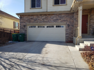 A newly installed residential garage door by 170 Springs LLC Garage Doors in Aurora, CO