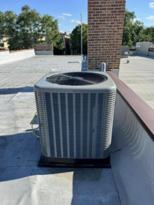 A new rooftop AC condenser unit installed by Four Stages, your trusted HVAC contractor in Chicago, IL.