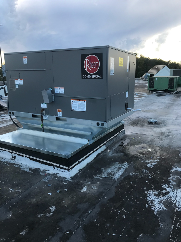 A newly installed Rheem commercial rooftop HVAC system by Giant HVAC in Chicago, IL