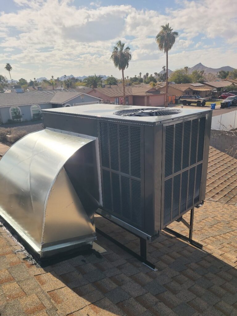 A newly installed rooftop HVAC unit with connecting ductwork, installed by Az AC and Heat Services in Queen Creek, AZ.