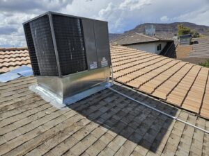 A new rooftop HVAC unit installed on a residential tiled roof by Colton Air Conditioning - Las Vegas in Las Vegas, NV.