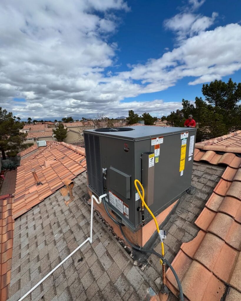 A newly installed rooftop HVAC unit on a residential tiled roof by Cool Camel HVAC in Henderson, NV