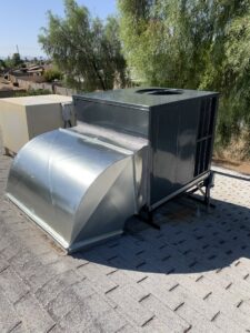 A newly installed rooftop HVAC unit on a residential building, provided by Valle Del Sol Home Services, LLC in Scottsdale, AZ.