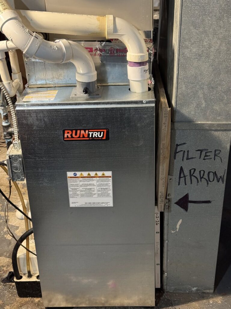 A close-up view of a new Run Tru furnace installed by Inspired Heating & Cooling, Electric, Roofing, Repair LLC in Columbus, OH.