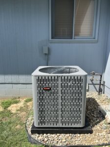 A newly installed RunTru outdoor air conditioning unit by Sandys Heating & Air in Papillion, NE.