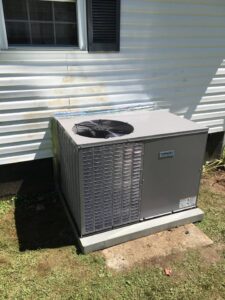 A new Tempstar outdoor HVAC unit installed next to a residential building by Eastern Air Flow of Kentucky in Richmond, KY.