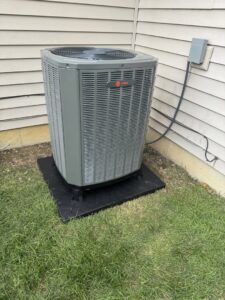 A newly installed Trane outdoor air conditioning unit by Roy Rogers Heating and Air in Indianapolis, IN.