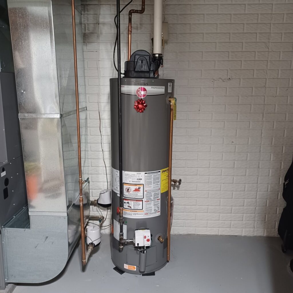 A newly installed water heater next to HVAC ductwork, showcasing services by Thrasher Service Corp in Des Moines, IA.