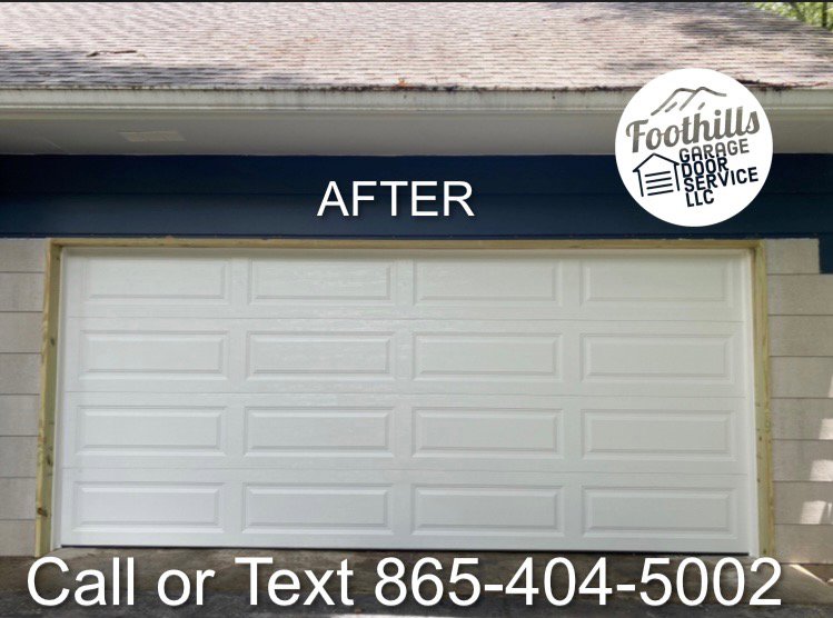 A newly installed white panel garage door by Foothills Garage Door Service LLC in Louisville, TN.
