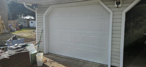 A new white panel garage door installation completed by Skreno Services in Summerville, SC.