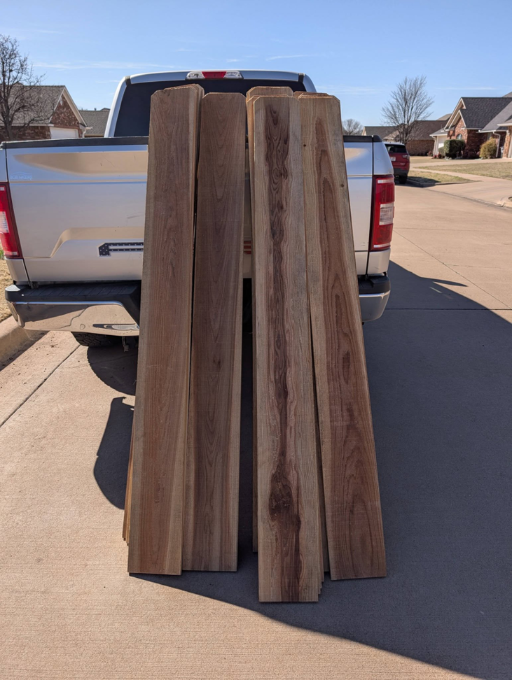 New wooden fence boards ready for installation, delivered by Black and Sons fencing in Indiahoma, OK.