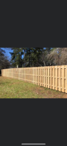 A newly installed wood privacy fence by ATM Construction in North Augusta, SC.