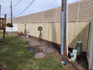 New wood privacy fence installed in a residential area by All Terrain Fence LLC in Waukegan, IL