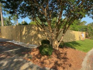 A new wood privacy fence installed around a residential property by Covenant Fence in Columbia, SC.
