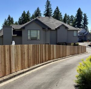 A newly installed wood privacy fence surrounding a residential property by Clark County Fence LLC in Vancouver, WA.