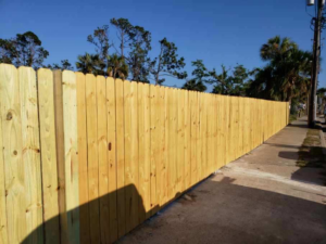 A new wood semi-privacy fence installed in a residential area by Melanie K. Lynch in Crawfordville, FL