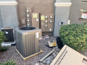 A new York outdoor AC unit on a pallet during installation by The Heating & Cooling Company LLC in Las Vegas, NV.