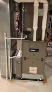 A newly installed YORK furnace and associated ductwork by Wright Heating and Air in Louisville, KY.